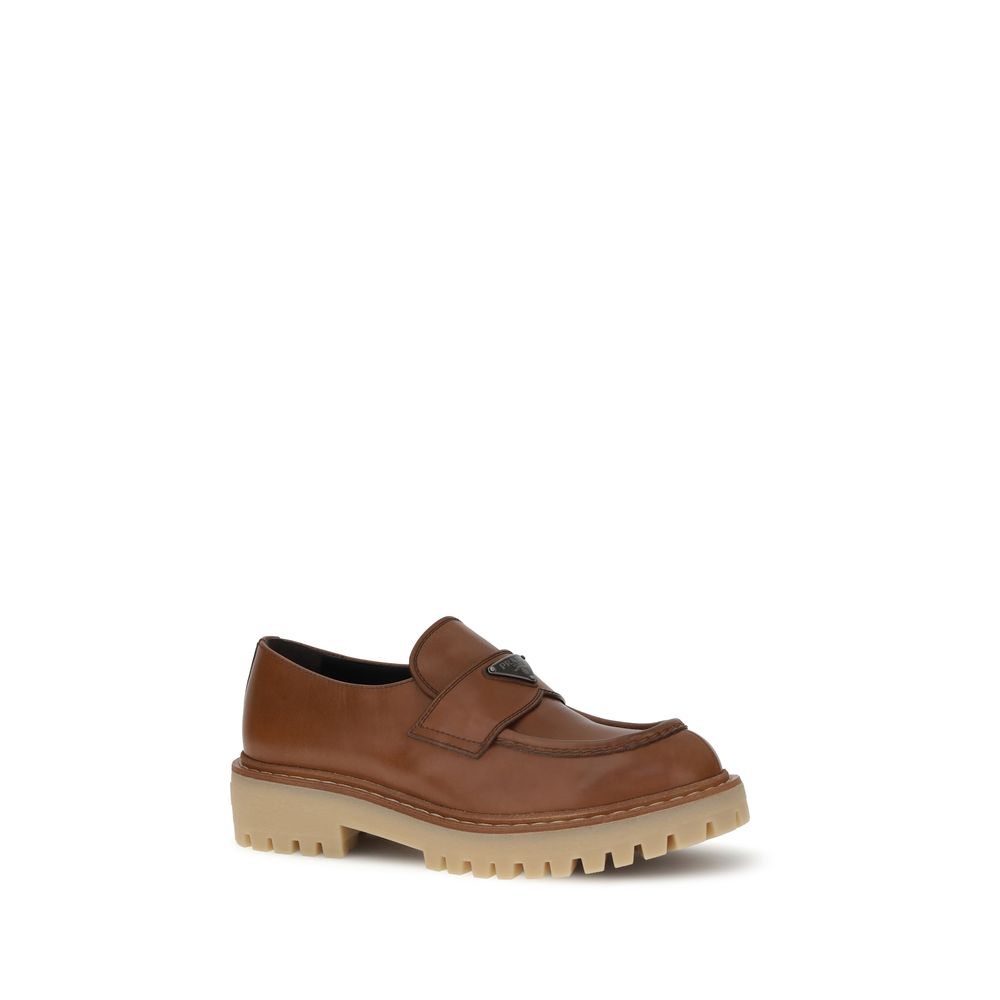Loafers Prada à effet cuir noir