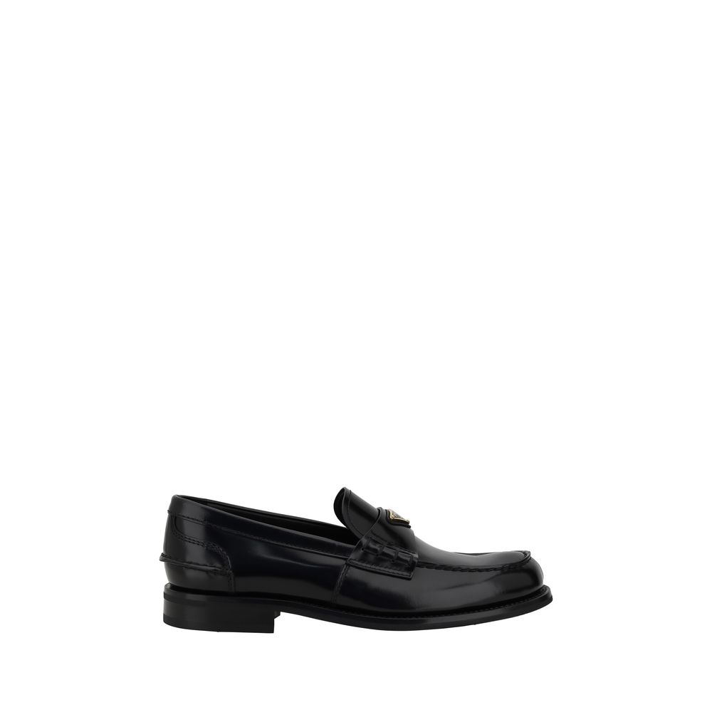 Loafers Prada avec plaque triangulaire noires