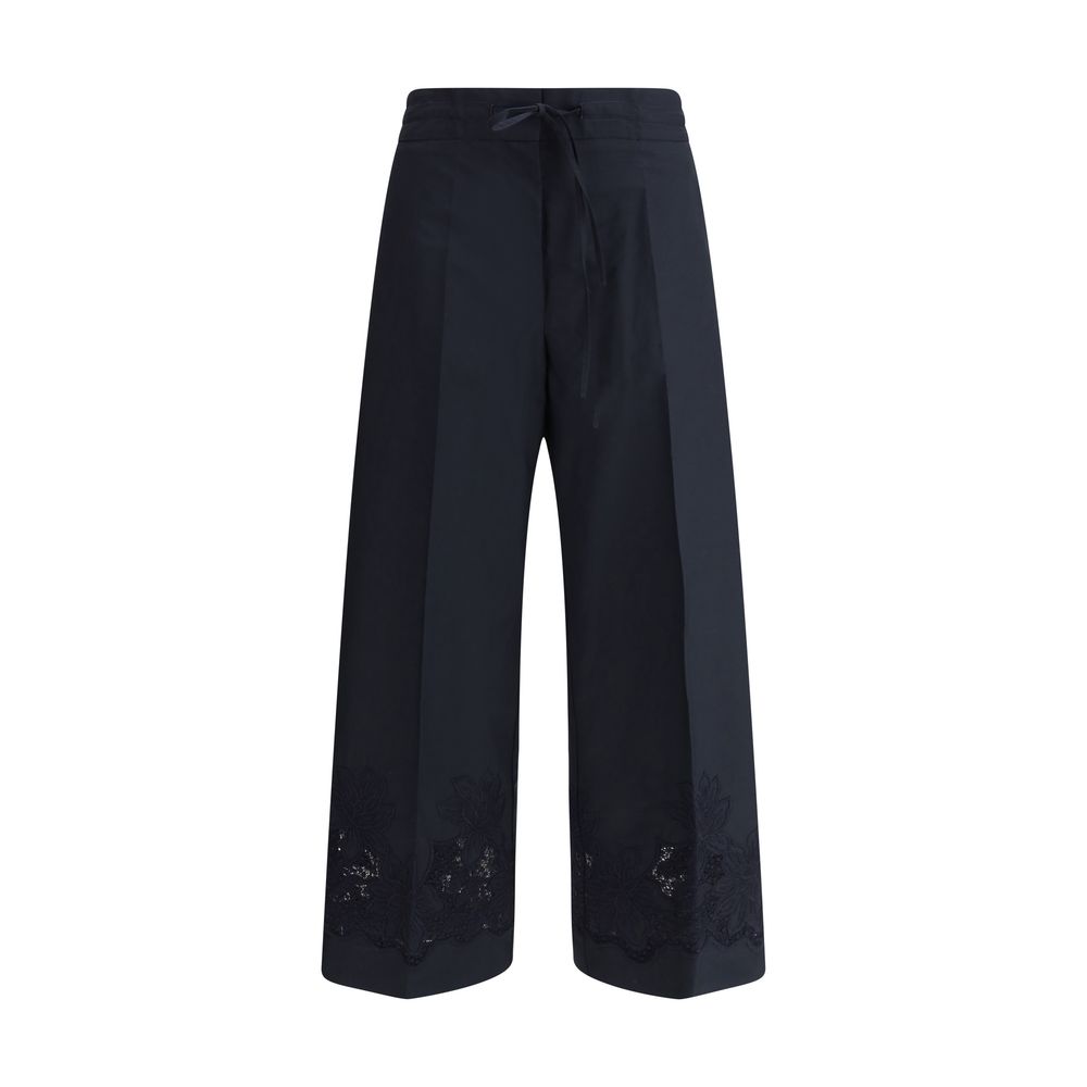 Pantalons P.A.R.O.S.H. à fleurs blancs