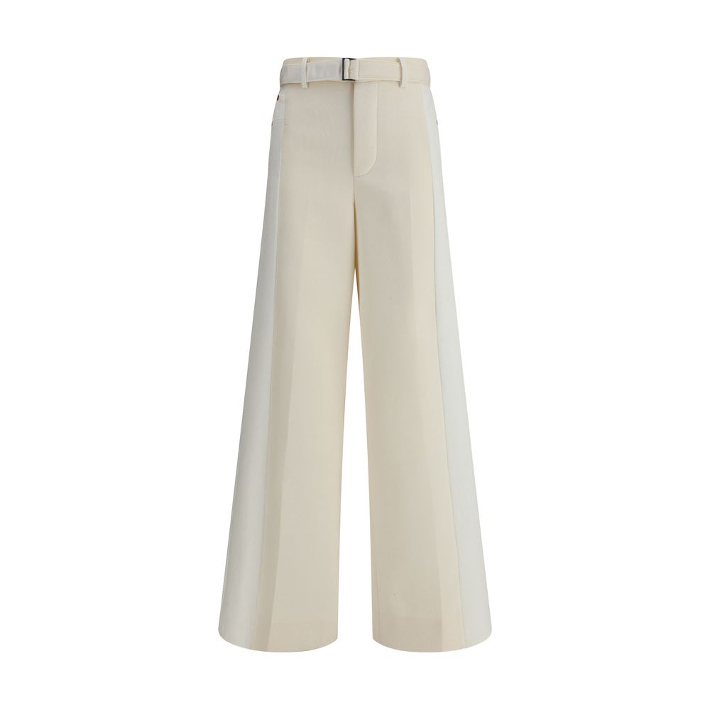 Pantalons Sacai en denim bleu