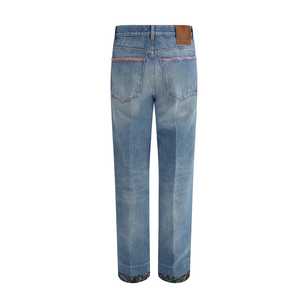 Jeans Valentino avec détails floraux blancs