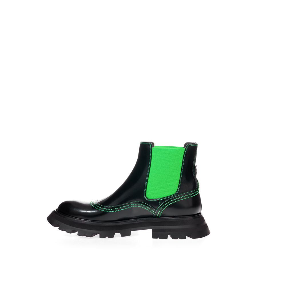Bottines Alexander McQueen Chelsea noires et vert néon