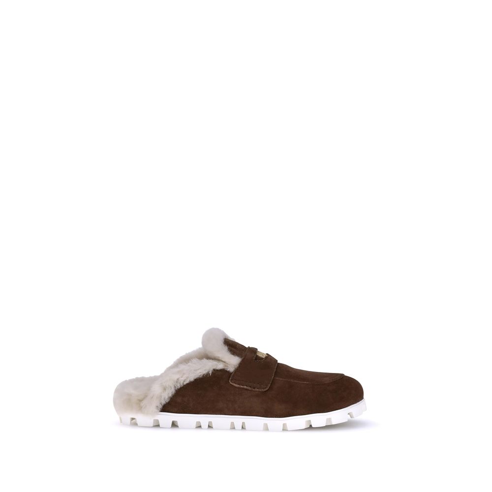 Mules Miu Miu en cuir beige
