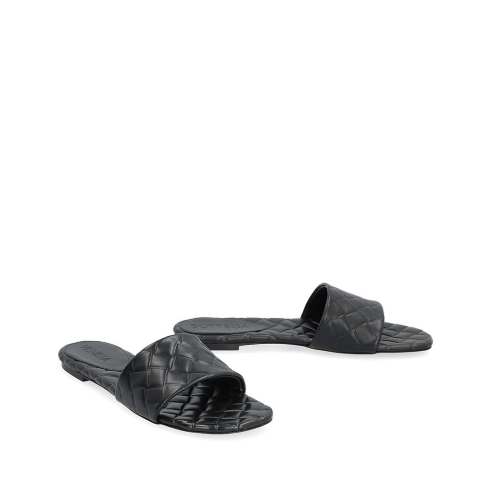 Mules Bottega Veneta Amy en cuir noir
