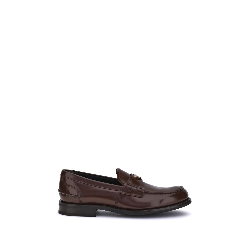 Loafers Prada avec plaque triangulaire noires