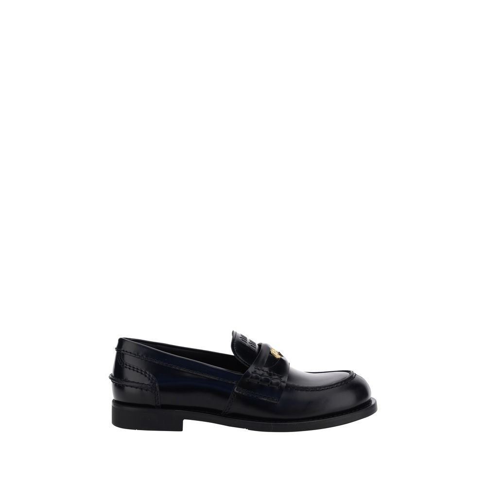 Loafers Miu Miu en cuir noires