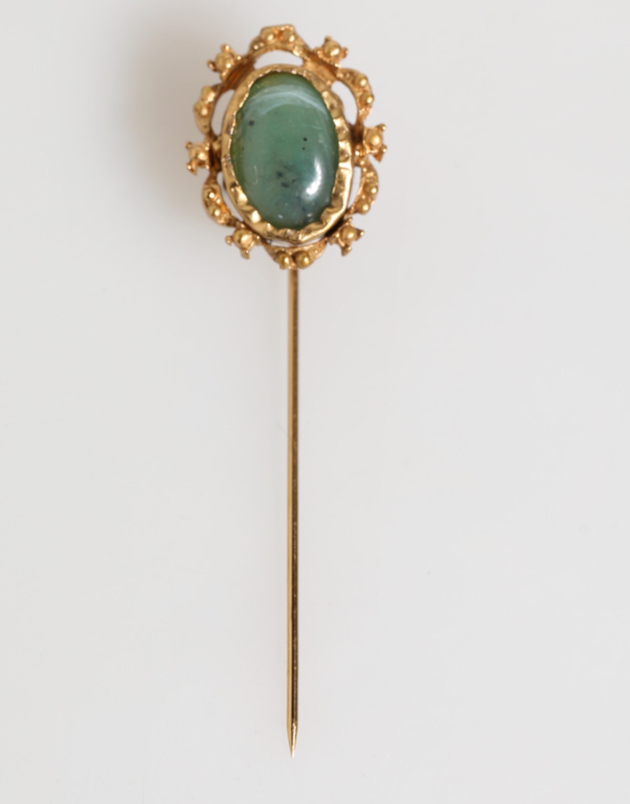 Broche Dolce & Gabbana en or avec pierre verte