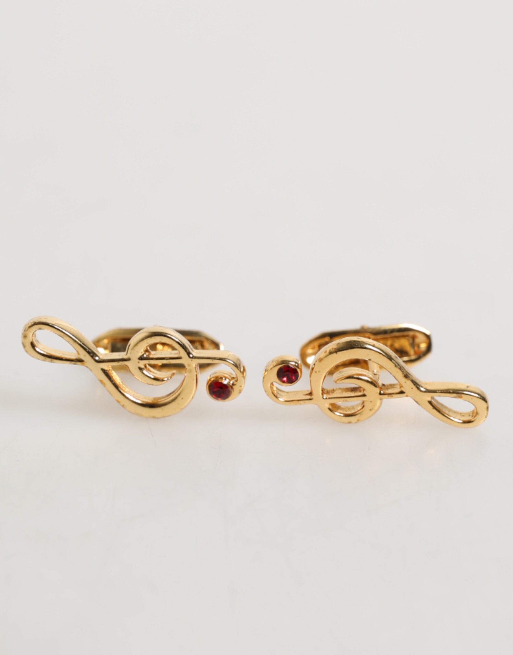 Épingles Dolce & Gabbana musicales dorées