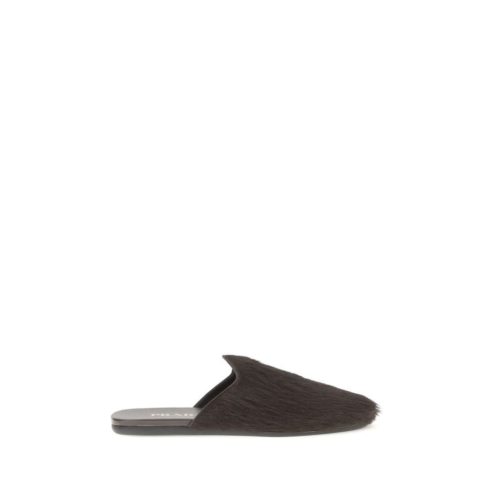 Mules Prada en cuir noires